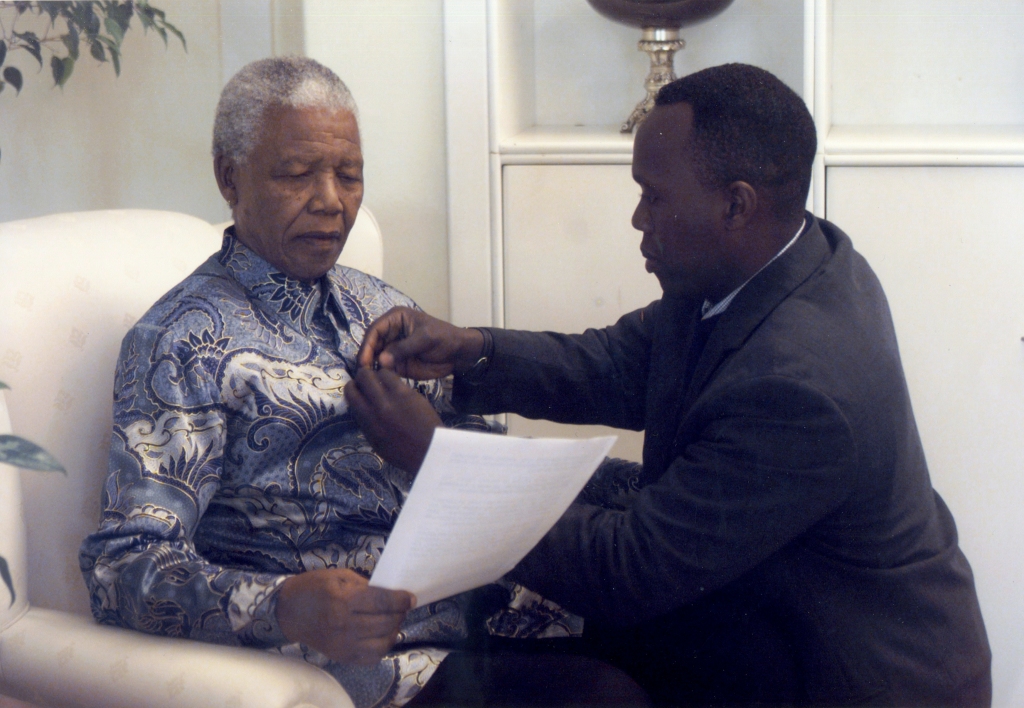JK. Adjusting the microphone for one of many interviews with Madiba at his home in Houghton, Johannesburg, 2000 copy